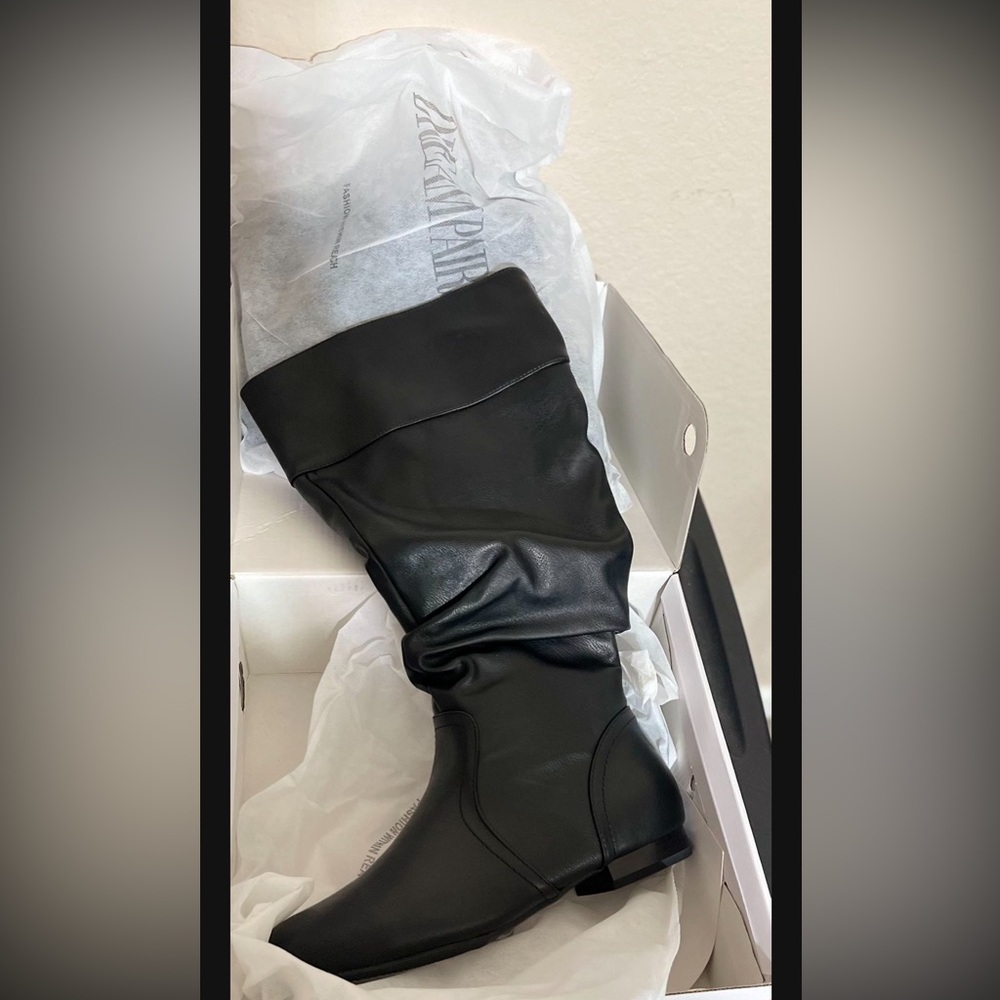 Brand new black boots